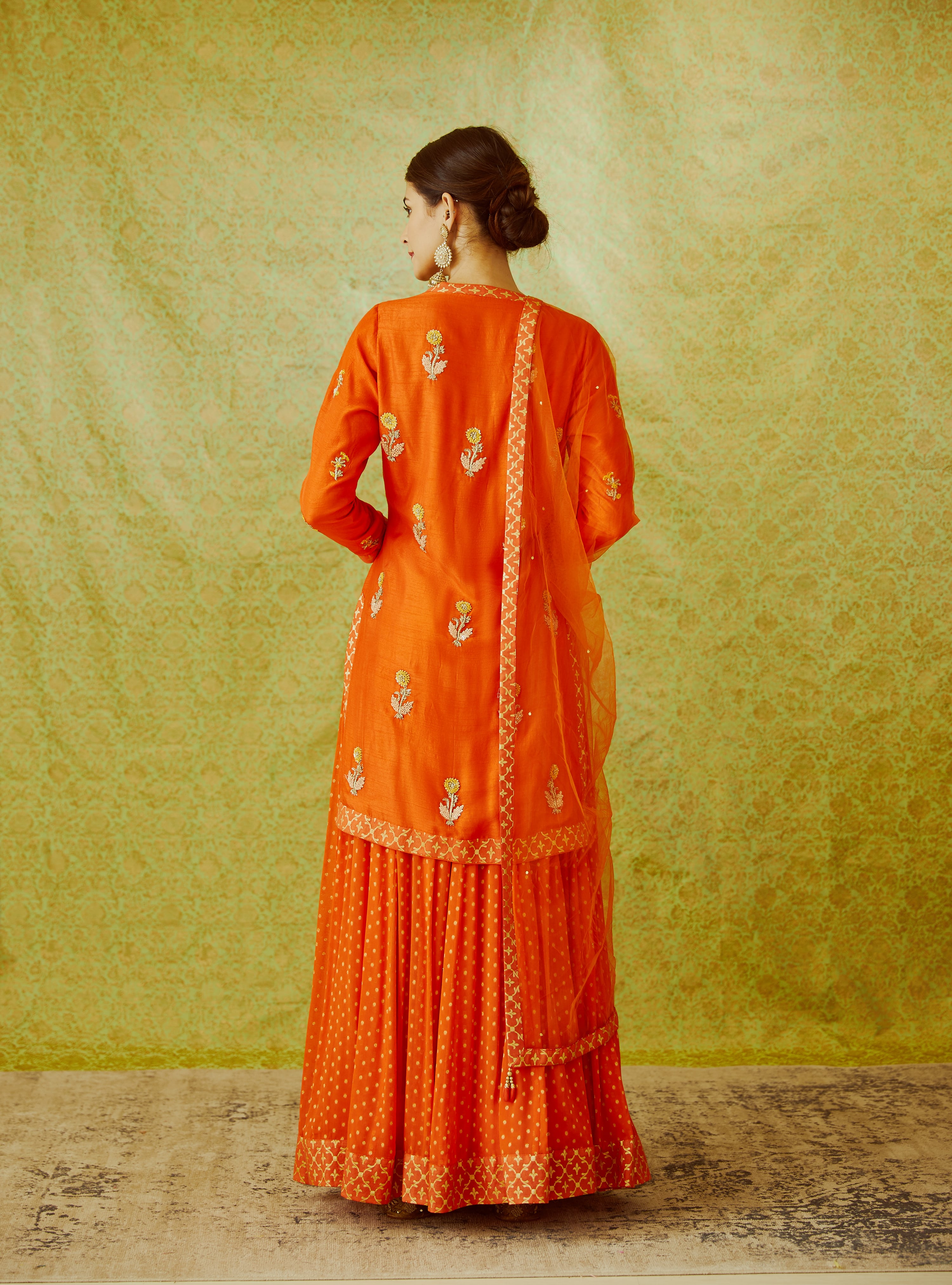 Orange Kurta & Skirt Set.